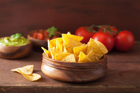 mexican guacamole and salsa dip, nachos tortilla chipsの写真素材