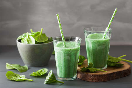 green spinach smoothie with spirulina, chia seed, lime, appleの写真素材
