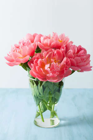 beautiful pink peony flowers bouquet in vaseの写真素材