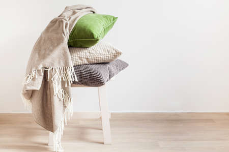 gray and green cushions, throw. cozy homeの写真素材