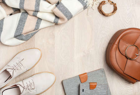 women's flat lay clothes shoes, scarf, bracelet, bag, tablet, smartlphone. Fashion blog, clothing, shoppingの写真素材