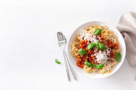 Spaghetti bolognese with basil and parmesan, italian pastaの写真素材