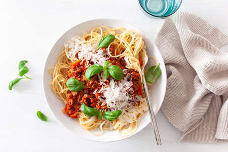 Spaghetti bolognese with basil and parmesan, italian pastaの写真素材