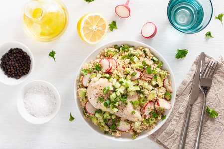 chicken breast with couscous, cucumber, avocado, spring onion, radish. healthy lunchの写真素材