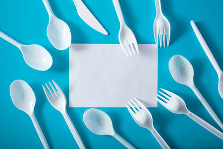 single use plastic forks, spoons. concept of recycling plastic, plastic wasteの写真素材