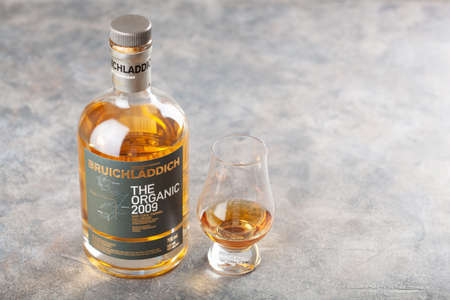Trondheim, Norway - May 20 2020: Bruichladdich single malt scotch whisky bottle and glassのeditorial素材