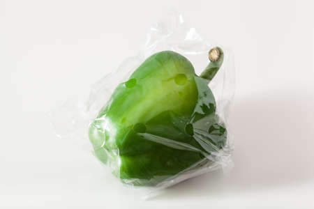 single use plastic packaging issue. peppers vegetables in plastic bag