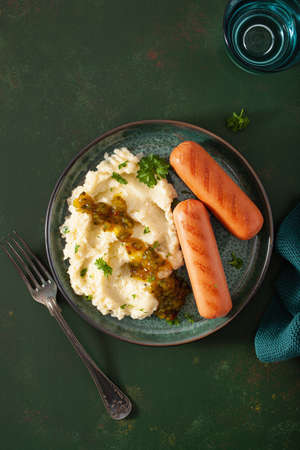mashed cauliflower and grilled sausages. ketogenic paleo diet lunchの写真素材