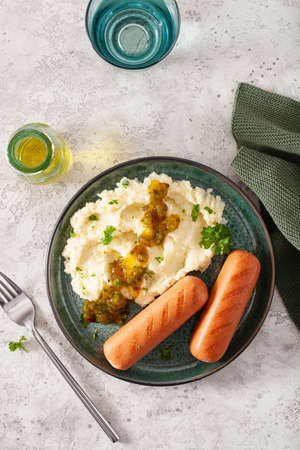 mashed cauliflower and grilled sausages. ketogenic paleo diet lunchの写真素材