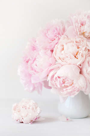 beautiful pink peony flowers bouquet in vaseの写真素材