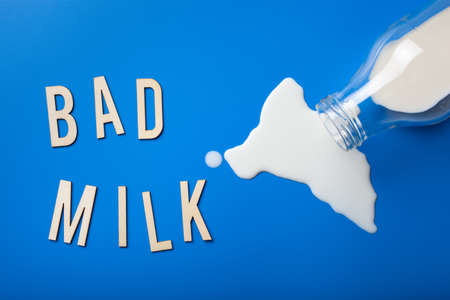 bad milk word text letters lactose intolerance allergy. milk splatter. avoid dangerous dairyの写真素材
