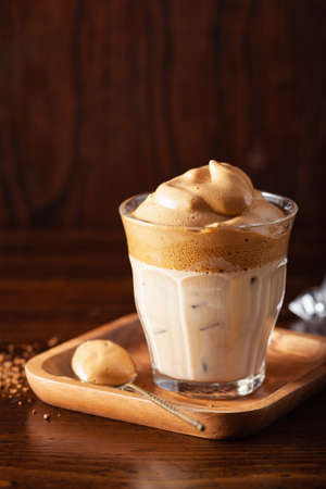 dalgona coffee in glass. trendy Instant coffee whipped with sugar and hot waterの写真素材