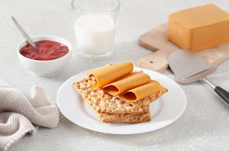 crispbread with Norwegian brunost traditional brown cheeseの写真素材