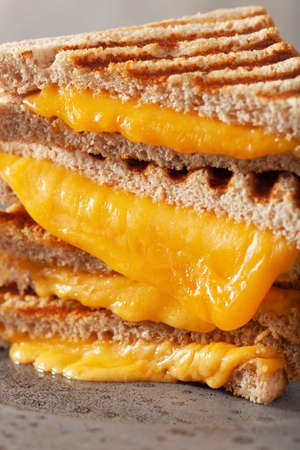 grilled cheese sandwich on gray concrete backgroundの写真素材