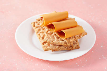 crispbread with Norwegian brunost traditional brown cheeseの写真素材