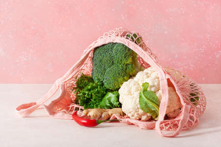 fruits vegetables in reusable mesh cotton bag, plastic free zero waste conceptの写真素材
