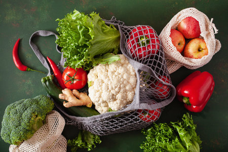 fruits vegetables in reusable mesh cotton bag, plastic free zero waste conceptの写真素材
