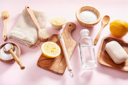 zero waste eco friendly cleaning concept. wooden brushes, lemon, baking soda, vinegarの写真素材