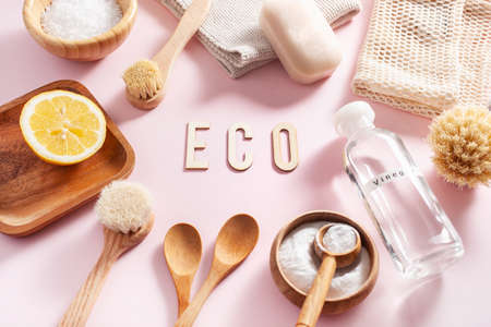 zero waste eco friendly cleaning concept. wooden brushes, lemon, baking soda, vinegarの写真素材