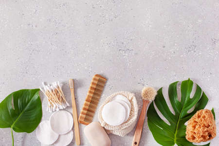 zero waste eco friendly hygiene bathroom concept. wooden toothbrush reusable pads wood buds brushの写真素材