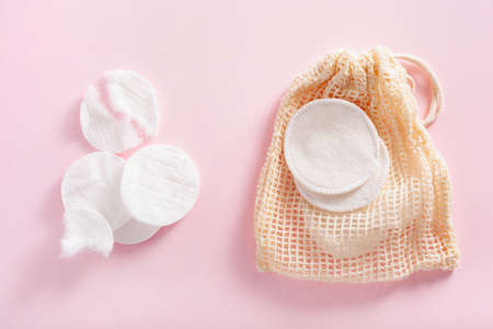 zero waste eco friendly hygiene bathroom concept. single use and reusable washable cotton padsの写真素材