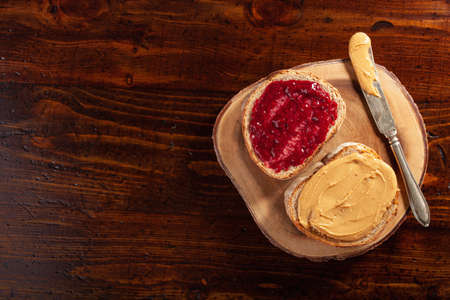smooth peanut butter and jam bread toast, american traditional sandwichの写真素材