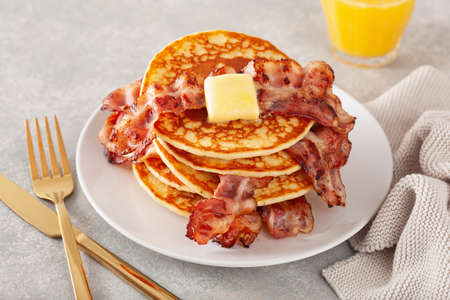 sweet bacon pancakes with butter. traditional american breakfastの写真素材