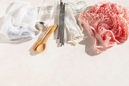 zero waste eco friendly concept. reusable cotton bag, stainless steel drinking staw, glass jar, wooden cutleryの写真素材