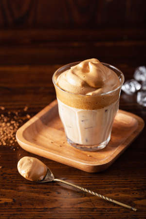 dalgona coffee in glass. trendy Instant coffee whipped with sugar and hot waterの写真素材