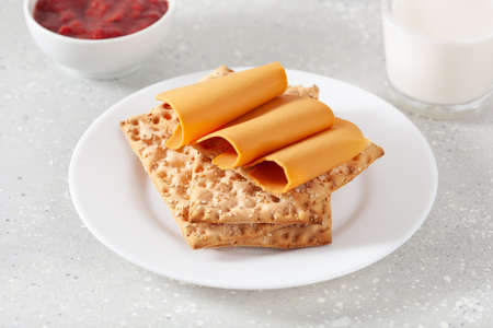 crispbread with Norwegian brunost traditional brown cheeseの写真素材