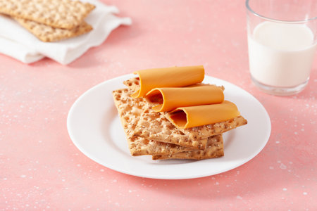 crispbread with Norwegian brunost traditional brown cheeseの写真素材