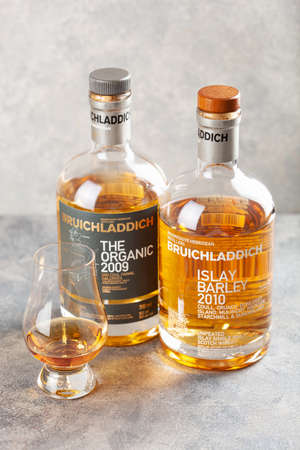 Trondheim, Norway - May 20 2020: Bruichladdich single malt scotch whisky bottle and glassのeditorial素材