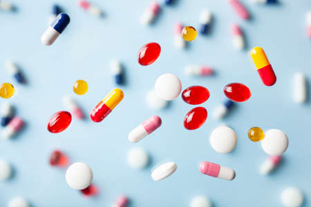 flying pill tablet capsule levitation medicine. medical treatment for disease flu virusの写真素材