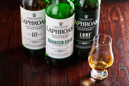Trondheim, Norway - Mai 18 2020: Laphroaig single malt scotch whisky 10 years, quarter cask, lore bottle and glassのeditorial素材