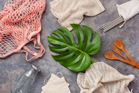 zero waste eco friendly concept. reusable cotton bag, stainless steel drinking staw, glass jar, wooden cutleryの写真素材