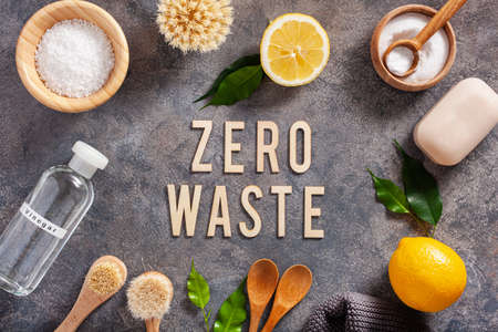 zero waste eco friendly cleaning concept. wooden brushes, lemon, baking soda, vinegarの写真素材