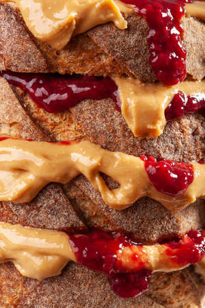 peanut butter and jam sandwich, american traditional bread toastの写真素材