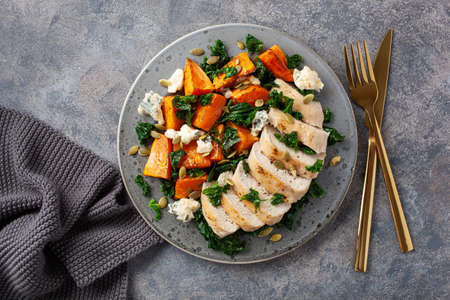 chicken breast with sweet potato, blue cheese and kale. healthy lunchの写真素材