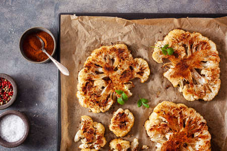 cauliflower steaks with herb sauce and spice. plant based meat substituteの写真素材