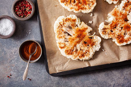cauliflower steaks with herb sauce and spice. plant based meat substituteの写真素材
