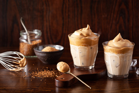 dalgona coffee in glass. trendy Instant coffee whipped with sugar and hot waterの写真素材