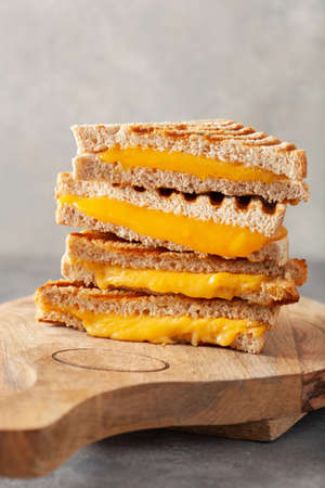 grilled cheese sandwich on gray concrete backgroundの写真素材