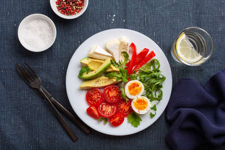 keto diet breakfast egg avocado brie cheese tomato bell pepperの写真素材