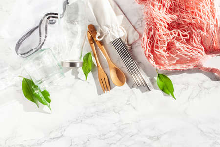 zero waste eco friendly concept. reusable cotton bag, stainless steel drinking staw, glass jar, wooden cutleryの写真素材