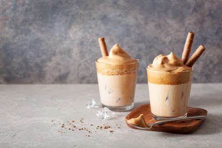 dalgona coffee in glass. trendy Instant coffee whipped with sugar and hot waterの写真素材