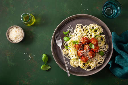 keto paleo diet zoodles spiralized zucchini noodles with meatballs and parmesanの写真素材