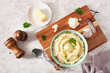 mashed cauliflower with butter. ketogenic paleo diet side dishの写真素材