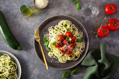 keto paleo diet zoodles spiralized zucchini noodles with meatballs and parmesanの写真素材