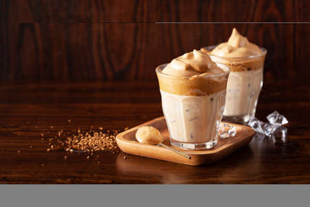 dalgona coffee in glass. trendy Instant coffee whipped with sugar and hot waterの写真素材