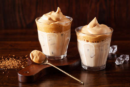 dalgona coffee in glass. trendy Instant coffee whipped with sugar and hot waterの写真素材